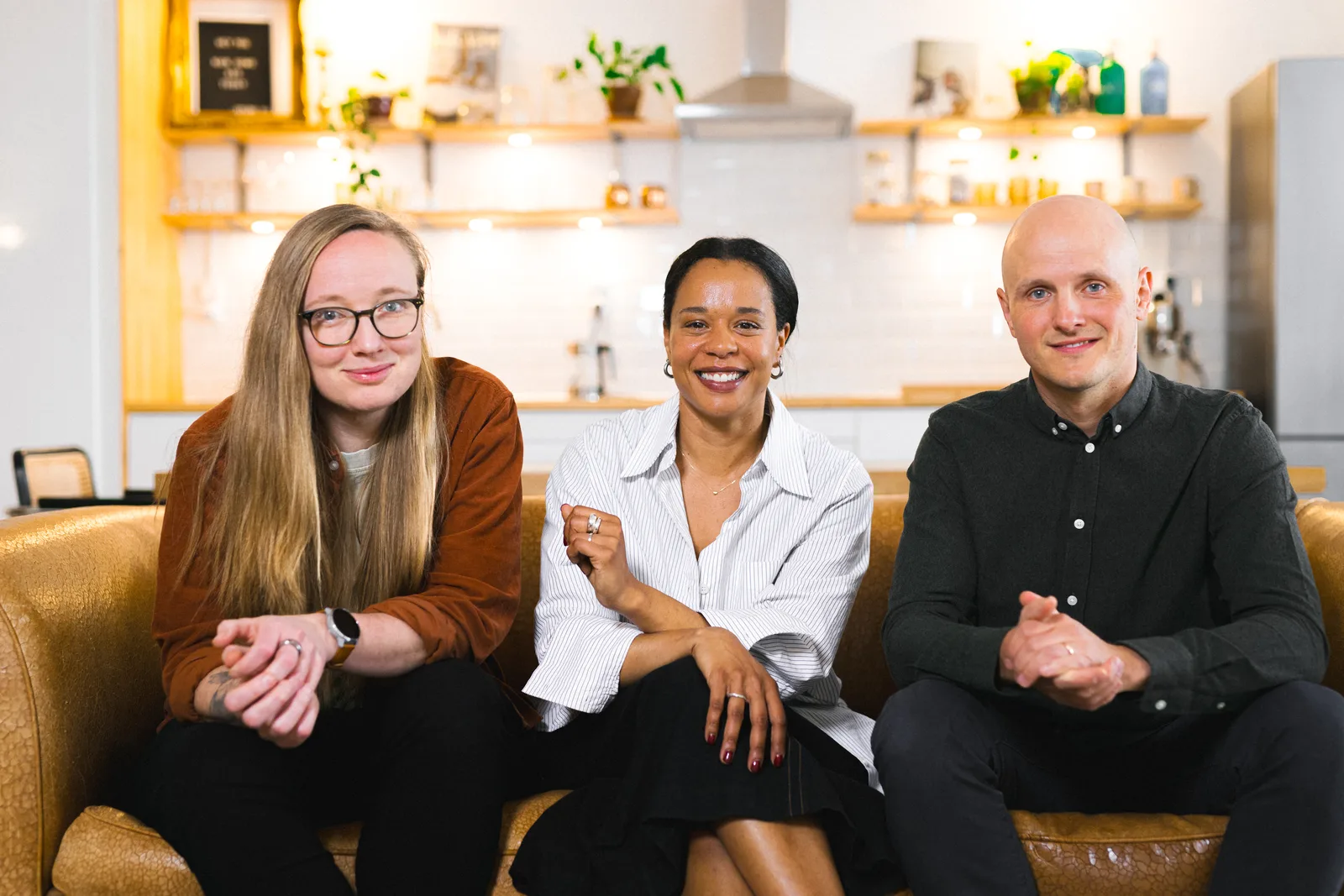 Three colleagues photographed for a company team page in Barcelona